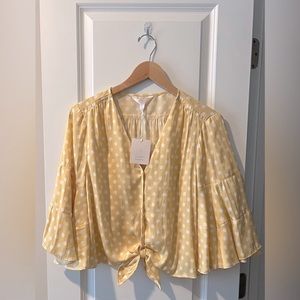 Lauren Conrad yellow and white polkadots croptop blouse. Size Large. New w/ tags